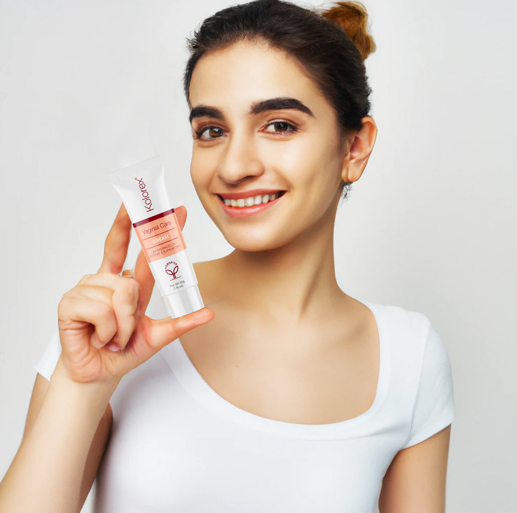 Woman holding Kolorex vaginal care cream
